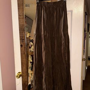 Made by Hairstone Roba. Dark brown broom skirt.